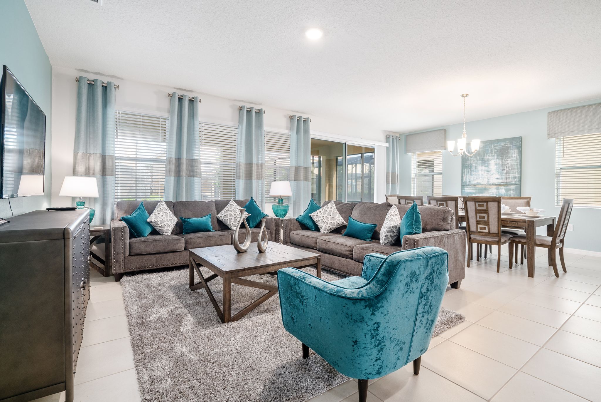 living area with couch and chairs